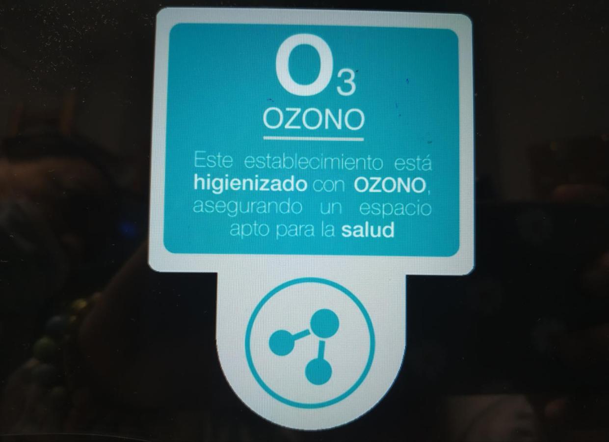 Hostal Paco'S Seville Exterior photo Ozone disinfection sign